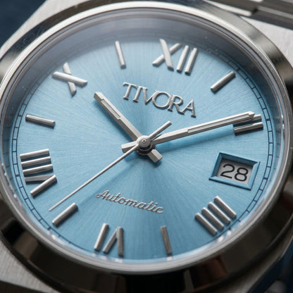 Élan Argent Steel Roman Ice Dial – close-up